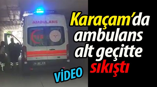 Geyve Karaçam'da ambulans geçitte sıkıştı