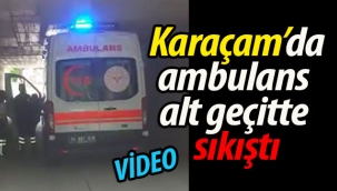Geyve Karaçam'da ambulans geçitte sıkıştı