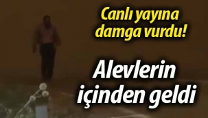 Bir anda alevlerin içinden çıkıp geldi