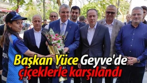 Başkan Yüce Geyve'de çiçeklerle karşılandı
