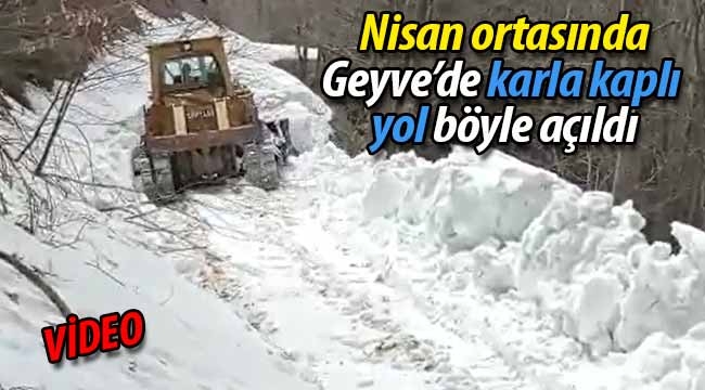 Geyve'de Nisan ortasında karla kaplı yol böyle açıldı