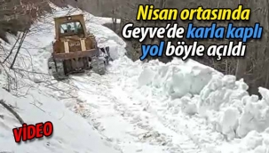 Geyve'de Nisan ortasında karla kaplı yol böyle açıldı