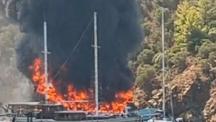 Fethiye'de denizin ortasında can pazarı! Alev topuna dönen teknedeki 115 kişi çareyi suya atlamakta buldu